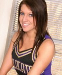 Watch as a slutty cheerleader strips out of her uniform showing off her huge tits