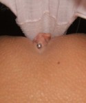 Monroe pulls open her pink panties to show off her pierced pussy