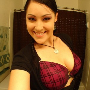 Kitty opens her shirt to show off her tight fredricks bra