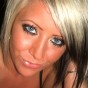 Monroe shows off her amazing stunning blue eyes as she strips and gets messy with chocolate sauce