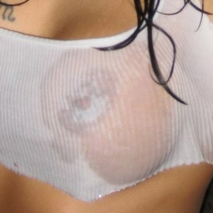 Horny girls perfect nipples are showing through her tiny wet tshirt