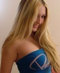 Busty blond teen in a blue tube top