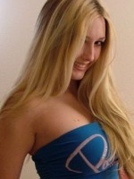 Busty blond teen in a blue tube top