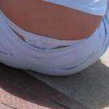 Candid pictures of tiny blonde girl showing her panties